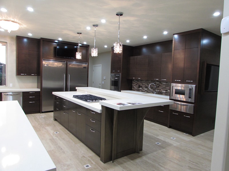 Kitchen-stainless-steel-appliances-sapele-finish-cabinets