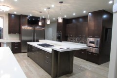 Kitchen-stainless-steel-appliances-sapele-finish-cabinets