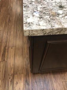 Island and Flooring Contrast